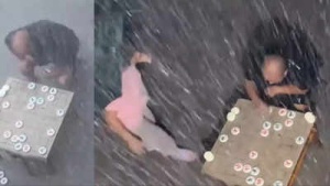 Chess Obsession: Player Endures 4-Hour Downpour After Loss, Captivating Grandmasters Niemann and Giri