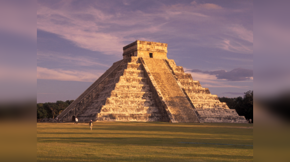 The ancient pyramids of Chichen Itza rising above the Yucatan jungle